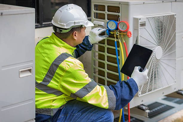 Professional Air Conditioning Repair technician working in Finger, TN